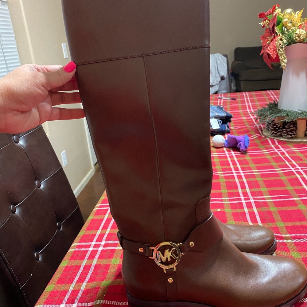 Michael kors leather boots new without tags. Display item